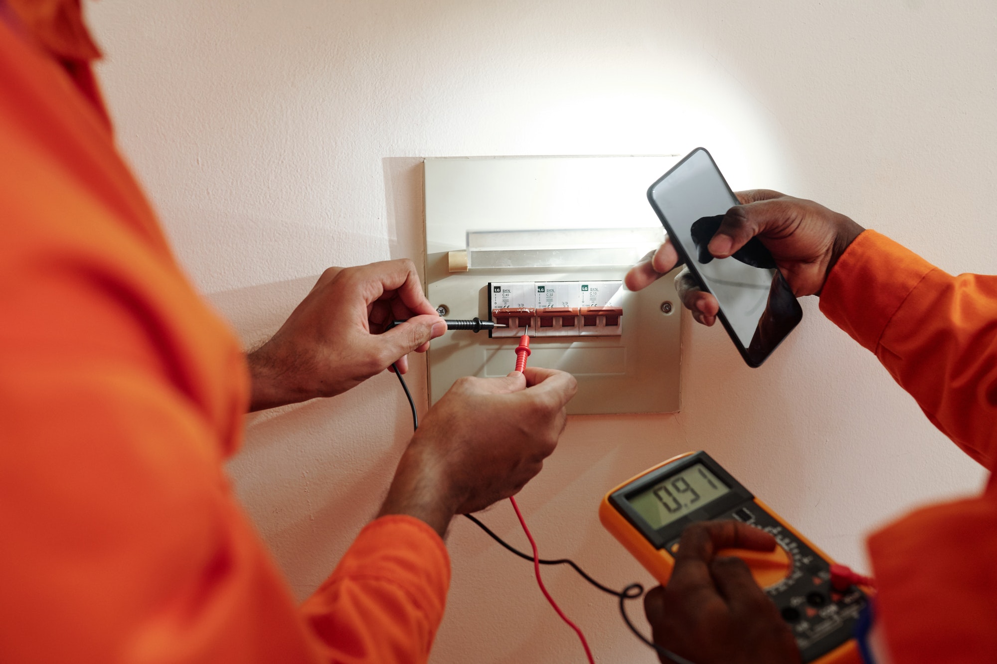 Technicians Testing Electric Current